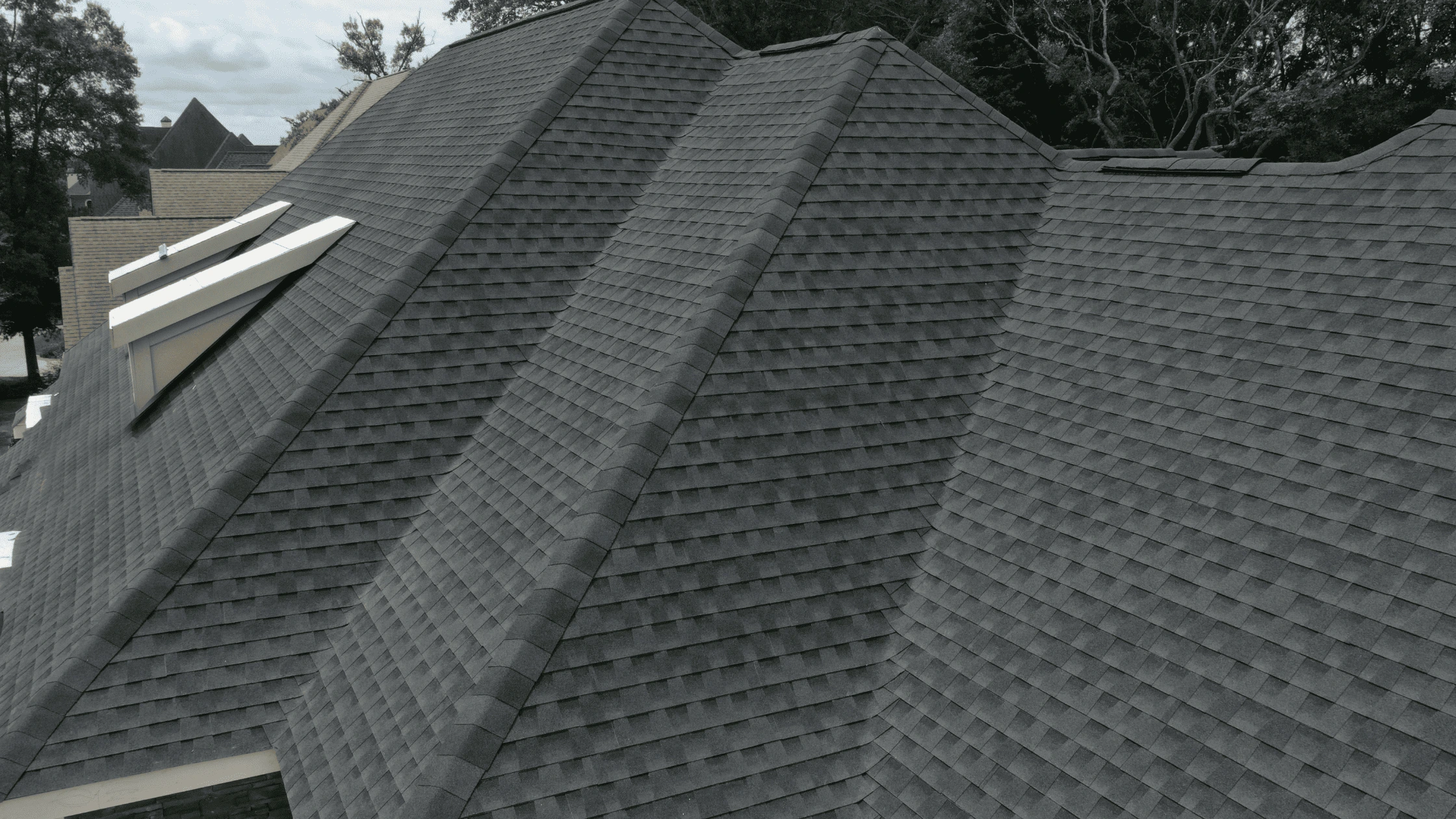 Asphalt shingle roofing on a residential home in Asheville, emphasizing improved curb appeal and property value.